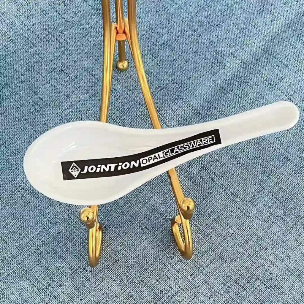 Opal glass soup spoon